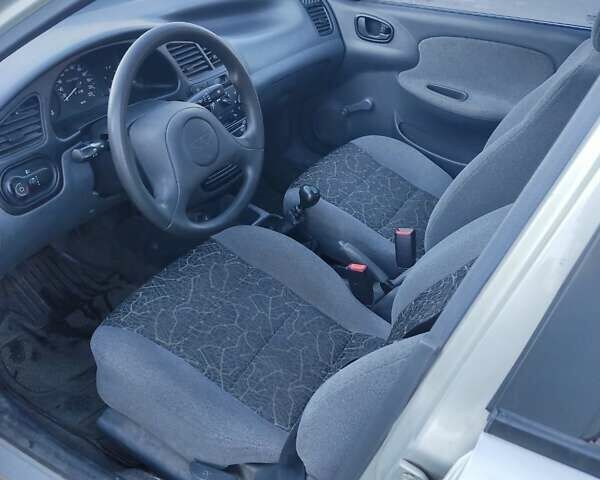 Сірий ЗАЗ Ланос, об'ємом двигуна 1.39 л та пробігом 96 тис. км за 1000 $, фото 5 на Automoto.ua