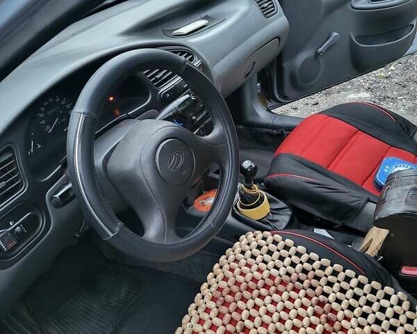 Серый ЗАЗ Ланос, объемом двигателя 1.6 л и пробегом 250 тыс. км за 2800 $, фото 11 на Automoto.ua