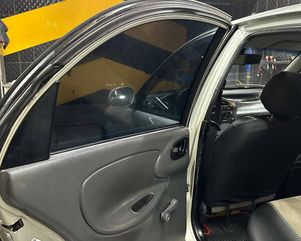 Сірий ЗАЗ Ланос, об'ємом двигуна 1.6 л та пробігом 270 тис. км за 1999 $, фото 17 на Automoto.ua