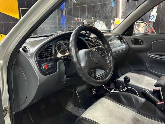 Сірий ЗАЗ Ланос, об'ємом двигуна 1.6 л та пробігом 270 тис. км за 1999 $, фото 16 на Automoto.ua