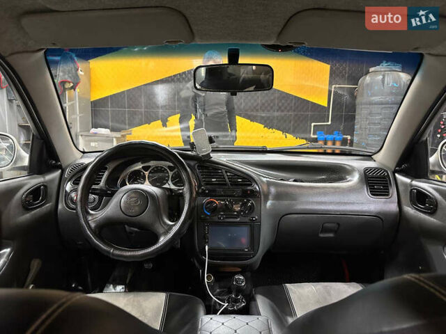 Сірий ЗАЗ Ланос, об'ємом двигуна 1.6 л та пробігом 270 тис. км за 1999 $, фото 28 на Automoto.ua