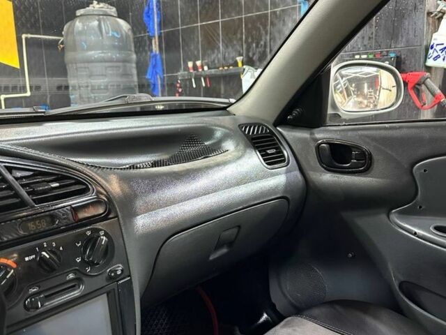 Сірий ЗАЗ Ланос, об'ємом двигуна 1.6 л та пробігом 270 тис. км за 1999 $, фото 18 на Automoto.ua