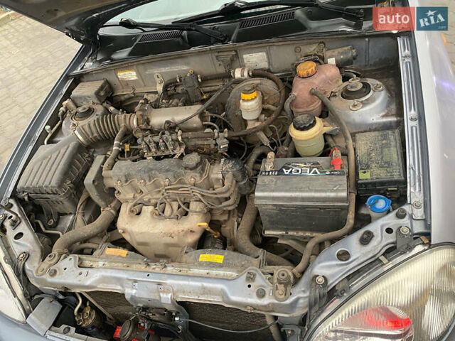 Сірий ЗАЗ Ланос, об'ємом двигуна 1.5 л та пробігом 241 тис. км за 2350 $, фото 6 на Automoto.ua