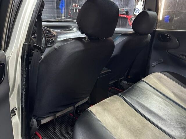 Сірий ЗАЗ Ланос, об'ємом двигуна 1.6 л та пробігом 270 тис. км за 1999 $, фото 15 на Automoto.ua