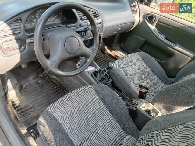 Сірий ЗАЗ Ланос, об'ємом двигуна 1.5 л та пробігом 260 тис. км за 2000 $, фото 4 на Automoto.ua