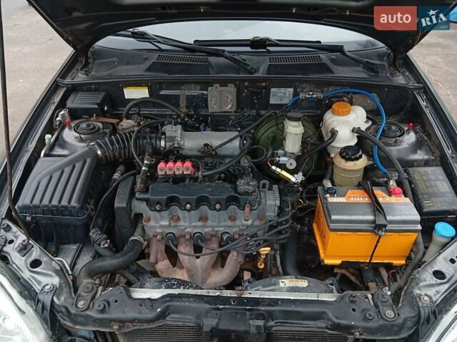 Серый ЗАЗ Ланос, объемом двигателя 1.5 л и пробегом 144 тыс. км за 2750 $, фото 13 на Automoto.ua