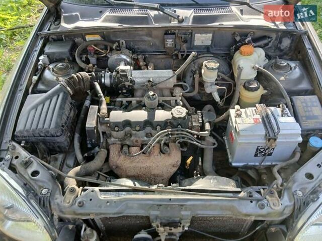 Сірий ЗАЗ Ланос, об'ємом двигуна 1.5 л та пробігом 260 тис. км за 2000 $, фото 5 на Automoto.ua