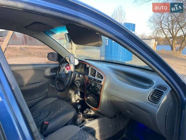 Синій ЗАЗ Ланос, об'ємом двигуна 1.39 л та пробігом 219 тис. км за 1700 $, фото 3 на Automoto.ua