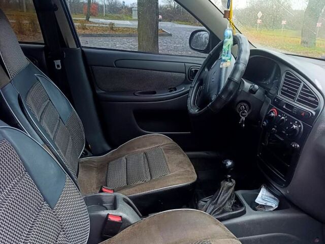 Синій ЗАЗ Ланос, об'ємом двигуна 1.6 л та пробігом 200 тис. км за 1750 $, фото 9 на Automoto.ua