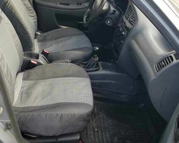 Синій ЗАЗ Ланос, об'ємом двигуна 1.5 л та пробігом 238 тис. км за 1500 $, фото 13 на Automoto.ua