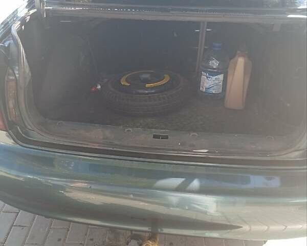 Зеленый ЗАЗ Ланос, объемом двигателя 1.6 л и пробегом 316 тыс. км за 3000 $, фото 5 на Automoto.ua