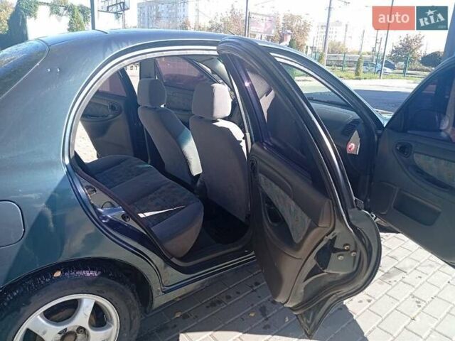 Зеленый ЗАЗ Ланос, объемом двигателя 1.6 л и пробегом 316 тыс. км за 3000 $, фото 3 на Automoto.ua