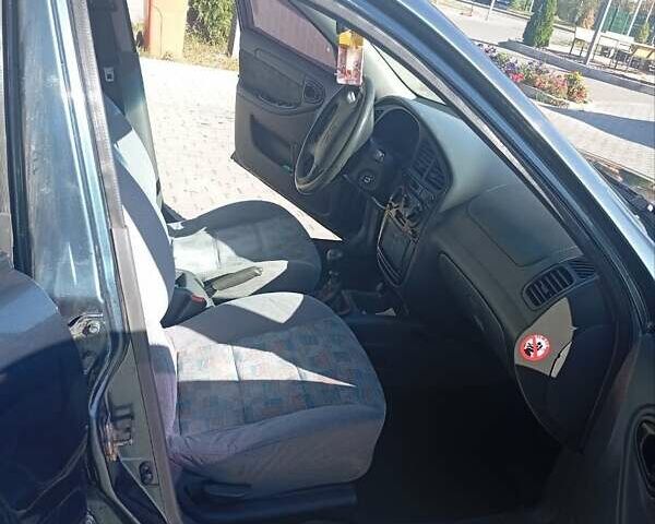 Зеленый ЗАЗ Ланос, объемом двигателя 1.6 л и пробегом 316 тыс. км за 3000 $, фото 2 на Automoto.ua