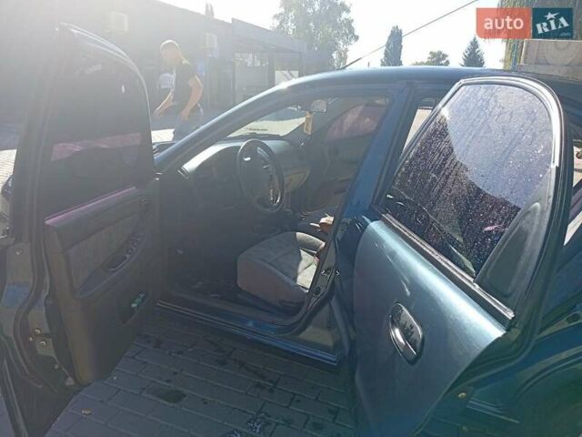 Зеленый ЗАЗ Ланос, объемом двигателя 1.6 л и пробегом 316 тыс. км за 3000 $, фото 7 на Automoto.ua