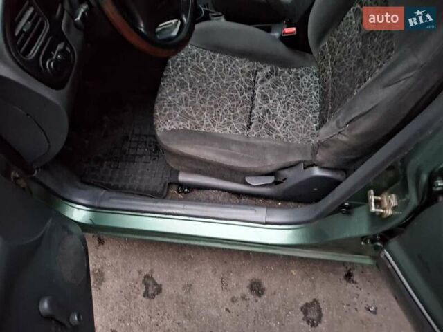 Зеленый ЗАЗ Ланос, объемом двигателя 1.5 л и пробегом 253 тыс. км за 2100 $, фото 5 на Automoto.ua