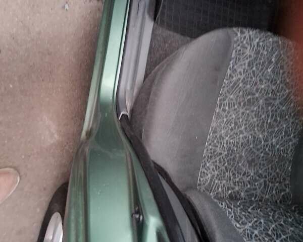 Зеленый ЗАЗ Ланос, объемом двигателя 1.5 л и пробегом 253 тыс. км за 2100 $, фото 2 на Automoto.ua