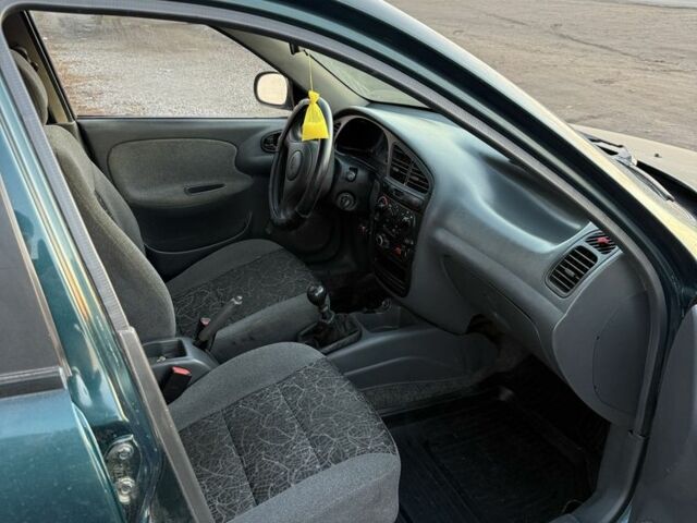 Зеленый ЗАЗ Ланос, объемом двигателя 1.4 л и пробегом 250 тыс. км за 1250 $, фото 3 на Automoto.ua