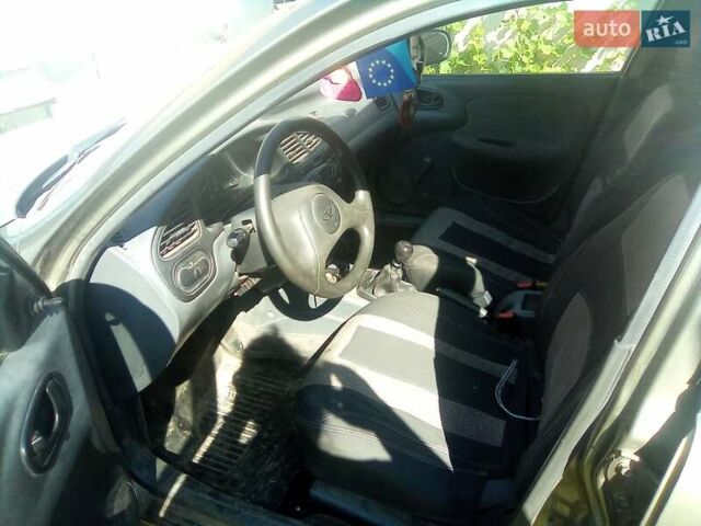 Зеленый ЗАЗ Ланос, объемом двигателя 1.4 л и пробегом 110 тыс. км за 2500 $, фото 1 на Automoto.ua