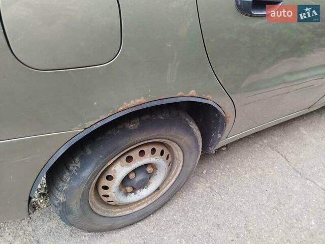 Зеленый ЗАЗ Ланос, объемом двигателя 1.39 л и пробегом 242 тыс. км за 1100 $, фото 4 на Automoto.ua