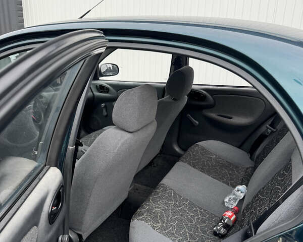 Зеленый ЗАЗ Ланос, объемом двигателя 1.39 л и пробегом 208 тыс. км за 1500 $, фото 5 на Automoto.ua