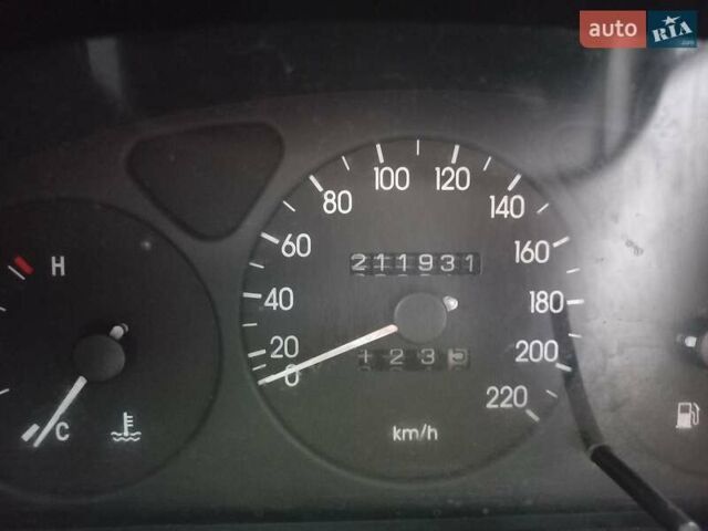 Зелений ЗАЗ Ланос, об'ємом двигуна 1.39 л та пробігом 212 тис. км за 1600 $, фото 7 на Automoto.ua