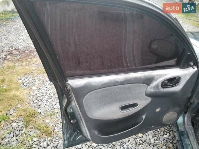 Зеленый ЗАЗ Ланос, объемом двигателя 1.4 л и пробегом 188 тыс. км за 1400 $, фото 18 на Automoto.ua