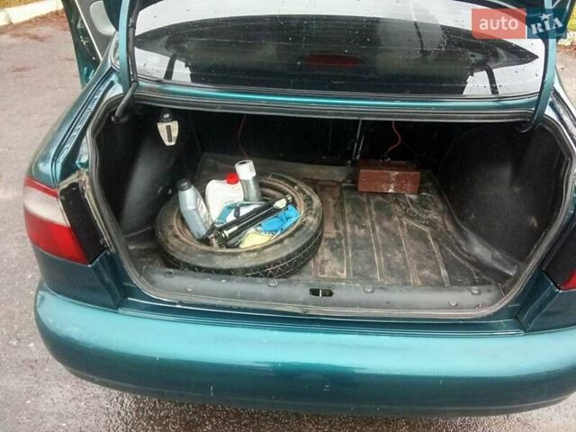 Зеленый ЗАЗ Ланос, объемом двигателя 1.5 л и пробегом 215 тыс. км за 1500 $, фото 11 на Automoto.ua