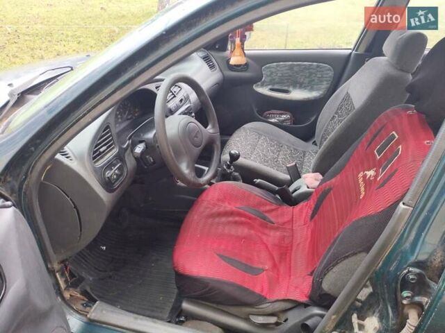 Зеленый ЗАЗ Ланос, объемом двигателя 1.6 л и пробегом 500 тыс. км за 650 $, фото 7 на Automoto.ua