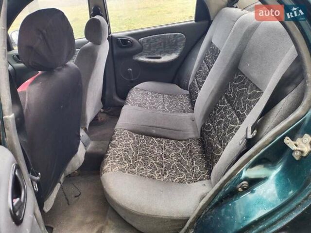 Зеленый ЗАЗ Ланос, объемом двигателя 1.6 л и пробегом 500 тыс. км за 650 $, фото 10 на Automoto.ua