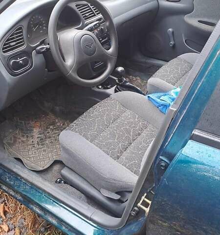 Зелений ЗАЗ Ланос, об'ємом двигуна 1.39 л та пробігом 87 тис. км за 2400 $, фото 4 на Automoto.ua