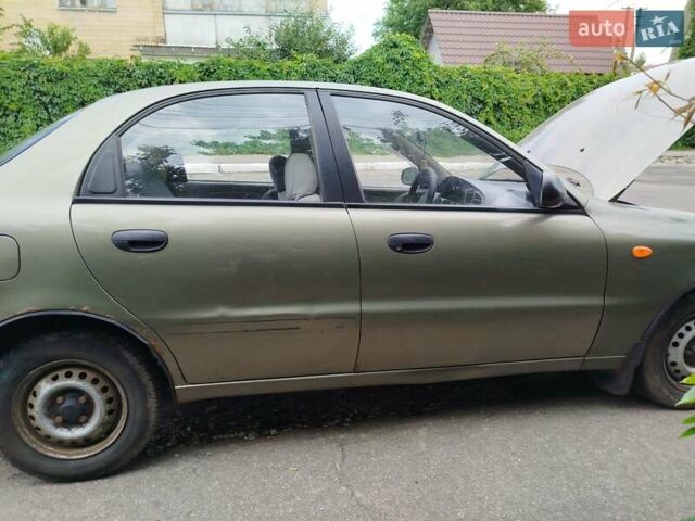 Зеленый ЗАЗ Ланос, объемом двигателя 1.39 л и пробегом 242 тыс. км за 1100 $, фото 5 на Automoto.ua