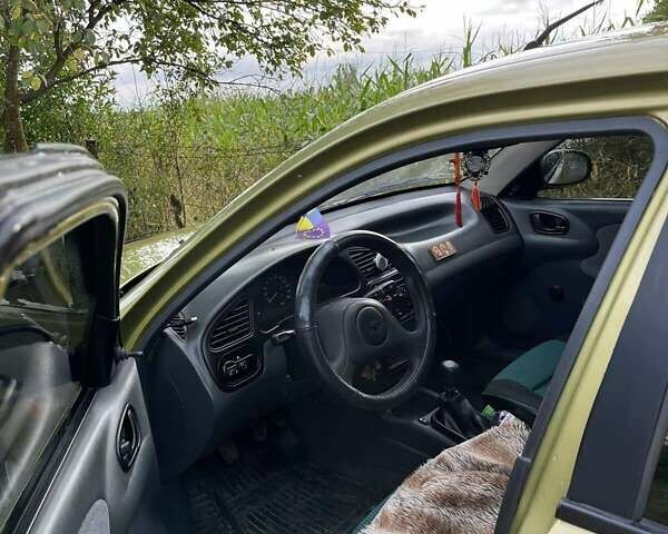 Зелений ЗАЗ Ланос, об'ємом двигуна 1.39 л та пробігом 237 тис. км за 2000 $, фото 4 на Automoto.ua