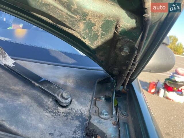 Зеленый ЗАЗ Ланос, объемом двигателя 1.6 л и пробегом 174 тыс. км за 3100 $, фото 36 на Automoto.ua
