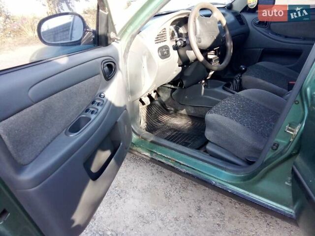 Зелений ЗАЗ Ланос, об'ємом двигуна 1.39 л та пробігом 130 тис. км за 2300 $, фото 9 на Automoto.ua