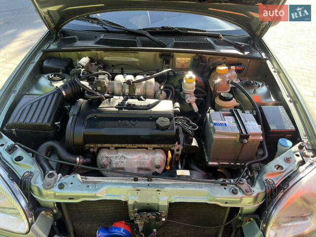 Зеленый ЗАЗ Ланос, объемом двигателя 1.6 л и пробегом 192 тыс. км за 2750 $, фото 9 на Automoto.ua