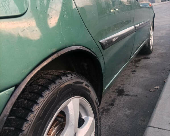 Зелений ЗАЗ Ланос, об'ємом двигуна 1.6 л та пробігом 210 тис. км за 1999 $, фото 8 на Automoto.ua