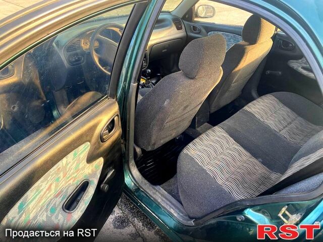 Зеленый ЗАЗ Ланос, объемом двигателя 1.5 л и пробегом 230 тыс. км за 2100 $, фото 7 на Automoto.ua