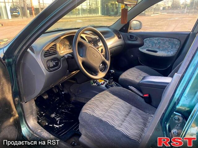 Зеленый ЗАЗ Ланос, объемом двигателя 1.5 л и пробегом 230 тыс. км за 2100 $, фото 4 на Automoto.ua