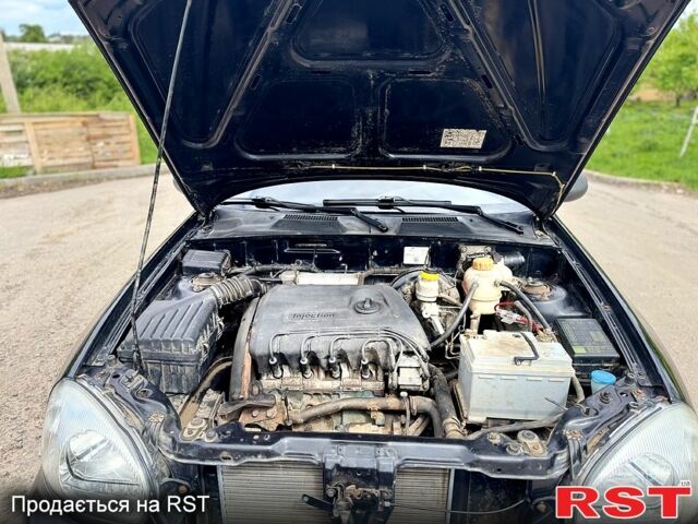 Чорний ЗАЗ Sens, об'ємом двигуна 1.4 л та пробігом 108 тис. км за 1999 $, фото 9 на Automoto.ua