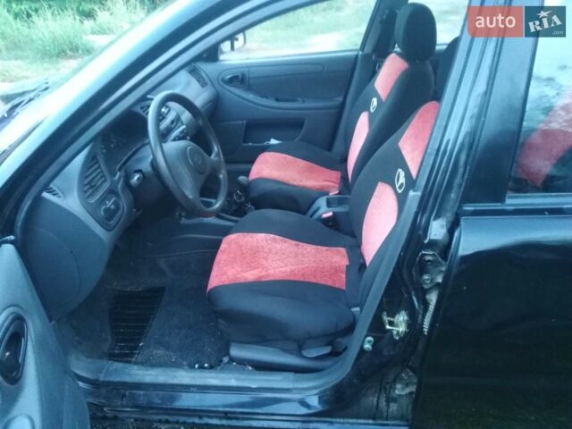 Чорний ЗАЗ Sens, об'ємом двигуна 1.3 л та пробігом 35 тис. км за 3000 $, фото 3 на Automoto.ua