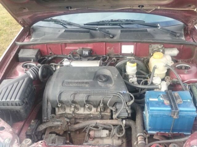 Красный ЗАЗ Сенс, объемом двигателя 1.3 л и пробегом 141 тыс. км за 2150 $, фото 5 на Automoto.ua