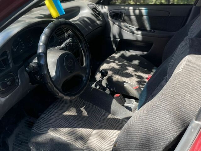 Красный ЗАЗ Сенс, объемом двигателя 1.3 л и пробегом 100 тыс. км за 1500 $, фото 6 на Automoto.ua