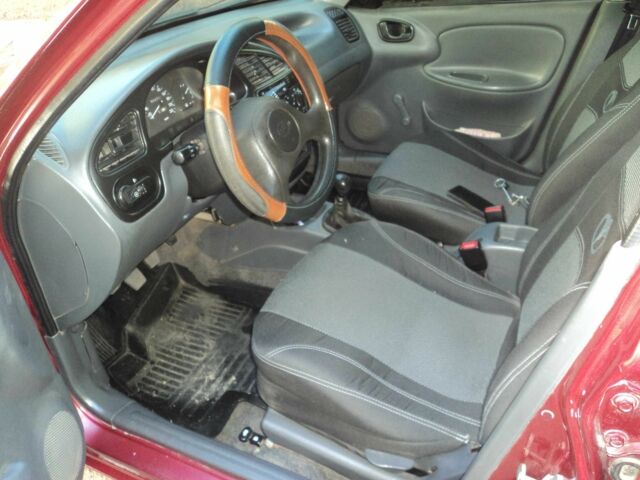 ЗАЗ Сенс 2012 в Никополе на Automoto.ua Красный ЗАЗ Сенс, объемом двигателя 1.3 л и пробегом 183 тыс. км за 2200 $, фото 6 на Automoto.ua