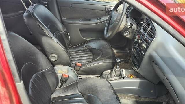 Красный ЗАЗ Сенс, объемом двигателя 2 л и пробегом 122 тыс. км за 2800 $, фото 1 на Automoto.ua