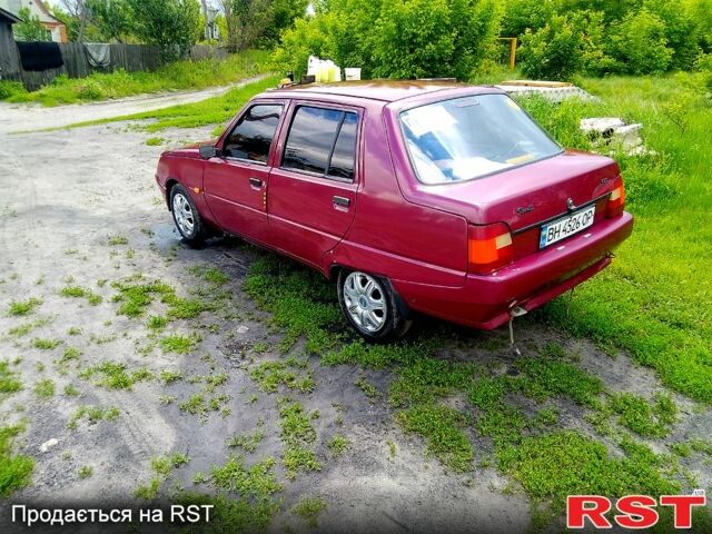 Красный ЗАЗ Славута, объемом двигателя 1.2 л и пробегом 160 тыс. км за 900 $, фото 7 на Automoto.ua