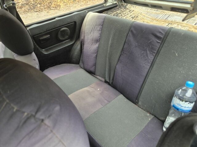 Белый ЗАЗ Таврия, объемом двигателя 1 л и пробегом 180 тыс. км за 750 $, фото 5 на Automoto.ua