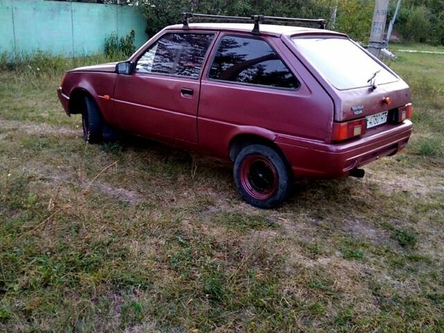 Червоний ЗАЗ Таврія, об'ємом двигуна 1.2 л та пробігом 150 тис. км за 605 $, фото 5 на Automoto.ua