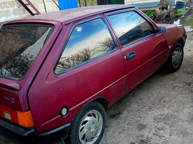 Красный ЗАЗ Таврия, объемом двигателя 12 л и пробегом 100 тыс. км за 370 $, фото 6 на Automoto.ua