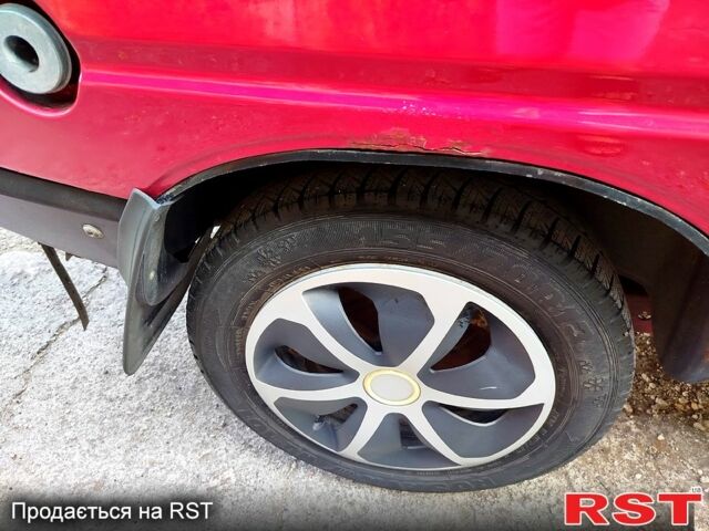 Красный ЗАЗ Таврия, объемом двигателя 1.1 л и пробегом 140 тыс. км за 600 $, фото 2 на Automoto.ua