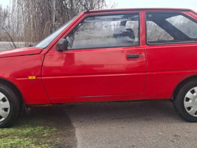 Красный ЗАЗ Таврия, объемом двигателя 1.2 л и пробегом 340 тыс. км за 750 $, фото 10 на Automoto.ua